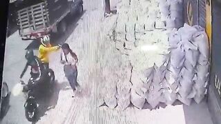 Woman Popped in the Head by Hitmen on Motorcycles
