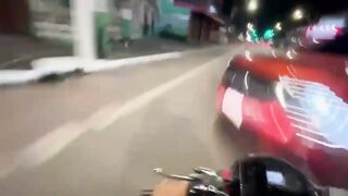Camera attached to the driver's helmet; motorcyclist was thrown by the impact (Fatal)