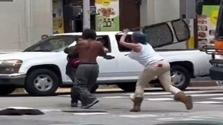 Woman Smashes Dude over the Head with a Chair WWE-style in Downtown LA. LOL