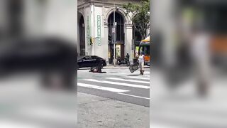 Woman Smashes Dude over the Head with a Chair WWE-style in Downtown LA. LOL