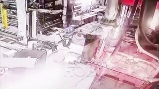 Worker inspecting Machine has his Head Cut Off (Slow Motion added)