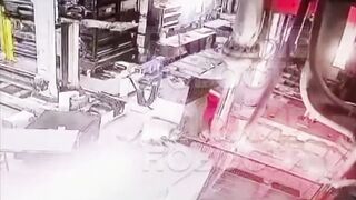 Worker inspecting Machine has his Head Cut Off (Slow Motion added)