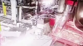 Worker inspecting Machine has his Head Cut Off (Slow Motion added)