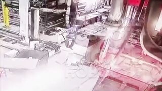 Worker inspecting Machine has his Head Cut Off (Slow Motion added)