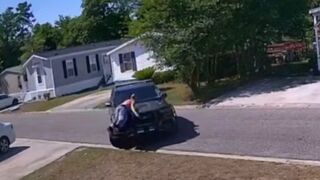 A tyrant who beat his wife rushed at the cops with scissors and was shot dead near his home