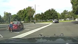 Drug Addict decides to Fight Car gets Instant Justice. I guess he didn't see the Cop