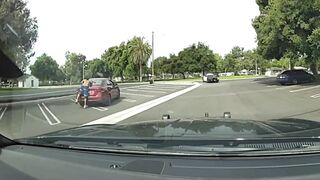 Drug Addict decides to Fight Car gets Instant Justice. I guess he didn't see the Cop