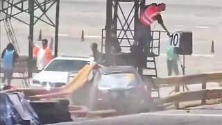 Photographer at Car Race gets Launched in Spectacular Accident (2 Angles)