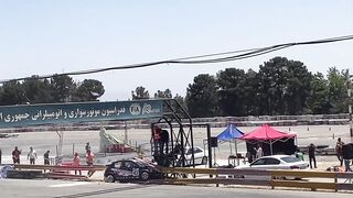 Photographer at Car Race gets Launched in Spectacular Accident (2 Angles)