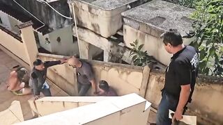 Dad? Brothers are caught red-handed for keeping their father's body inside their house on the Island for at least 6 months;