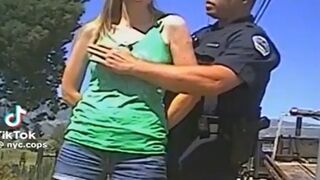 Dashcam footage shows a police officer mistakenly arresting and groping a woman