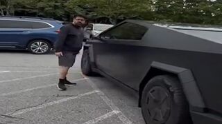 Woke Beta Male Goes Full Retard when he Sees a Tesla.
