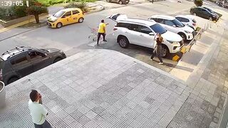 Man Fights Back and Nails One on the back of Motorcycle (Guy in Yellow) Crazy Shootout