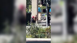 Dude Lays a Butt Whoppin on a Migrant Who was Throwing bottles at People.