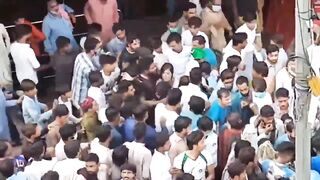Disturbing: Group of Women without Hijab are Surrounded and Swarmed by Group of Muslims