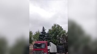Drunk local truck drivers laugh and panic as drone nearly hits them