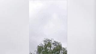 Drunk local truck drivers laugh and panic as drone nearly hits them