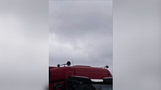 Drunk local truck drivers laugh and panic as drone nearly hits them