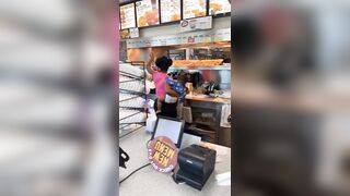 Woman holding her Baby helps Herself to the Chicken. Pay? nah