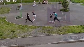 Psycho Kid with 2 Knives chases Man thru Playground, but gets quick Justice