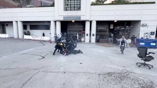 ICE detention center in Los Angeles is Defended by Riot Police from Liberals
