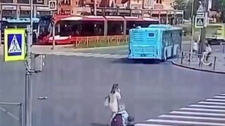 Woman on the Phone ends up in Wheels of a Bike