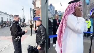 British Police take Christian Preacher's Microphone while Muslims Pray Loudly all Day