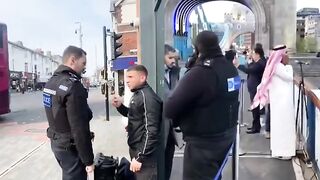 British Police take Christian Preacher's Microphone while Muslims Pray Loudly all Day