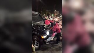Low IQ Illegal Aliens light themselves on FIRE after dousing Jeep with gasoline