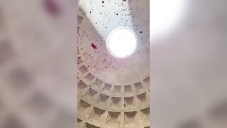 Spectacular Tradition of Rose Petals Fluttering Down the Oculus of the Pantheon for Pentecost.