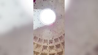 Spectacular Tradition of Rose Petals Fluttering Down the Oculus of the Pantheon for Pentecost.