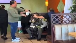 Workers at Mexican Restaurant help Injured & Exhausted Police Officer.