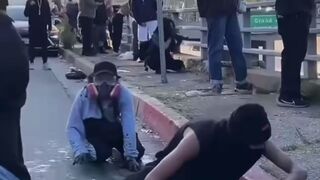 Rioters hide on Bridge and Stone Entire Troop of LAPD. This is CRAZY