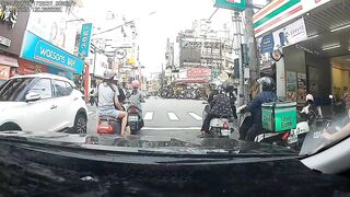 Taiwan: Watch the poor guy riding with his girl.