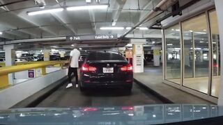 This is from Houston Texas. Man in Parking Garage pulls Shoots at Random Cars
