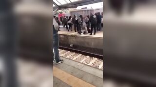 Pickpocket Woman held down until Police Arrive