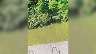 Man lights Himself on Fire and goes Jogging, runs right past Girl on Scooter