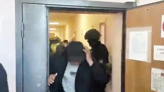 Security forces raided illegal migrants in a dorm.