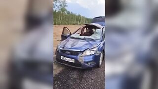 Mess: Driver Hits Moose and somehow Survives to make this Video