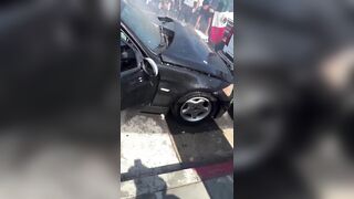 Protestor in LA thrown Explosive at BMW and Blow off the Fingers of the Driver