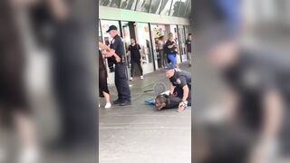 Many men film and watch without helping the woman attacked by usual suspect. Intolerable.