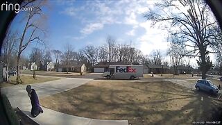 FedEx Driver Stops to Pray at Shrine Outside Customers Home.