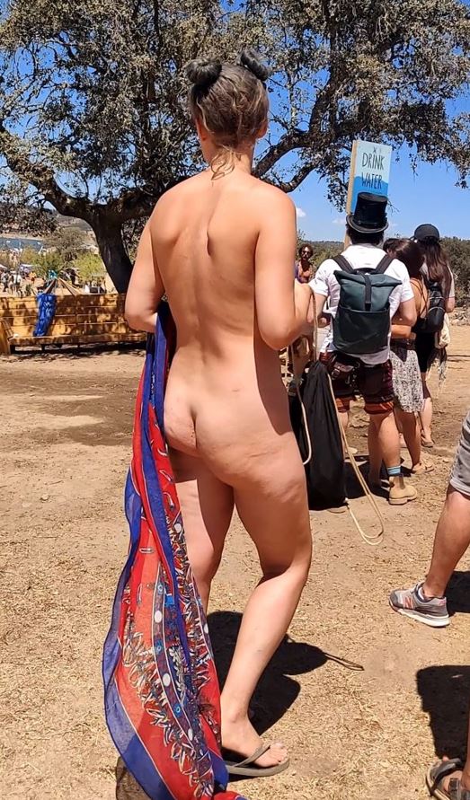 Girl walking full naked at public festival