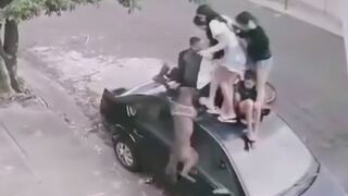 Quick thinking Kids jump on top of Car to Avoid Pitbull. Pitbull never gives up