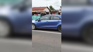 Pay Arrention: Motorcycle Taxi Funeral Celebration sends one Man down the Street (Slow Motion)