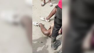 Pay Arrention: Motorcycle Taxi Funeral Celebration sends one Man down the Street (Slow Motion)
