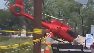 Helicopter Crashes Outside a Waterfront Restaurant in Michigan