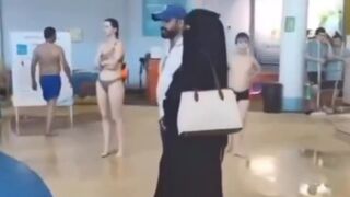 Parents at Water Park ask her to leave because she scares children. Do you agree with parents?