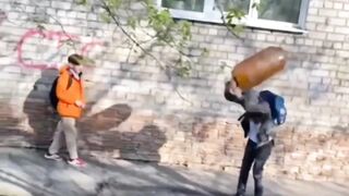 Kid effs around with a pressurized plastic jug, finds out