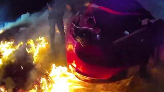 Heroic Police save Woman fleeing them from Burning Alive in her Car